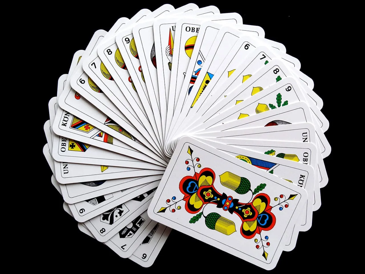Playing cards in white and yellow tones